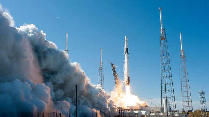 A SpaceX Falcon 9 rocket with the Dragon cargo module lifts off at Cape Canaveral in December 2019.