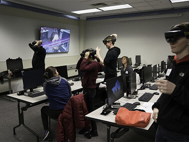 A class of students experimentig with Augmented Reality (AR) for Construction