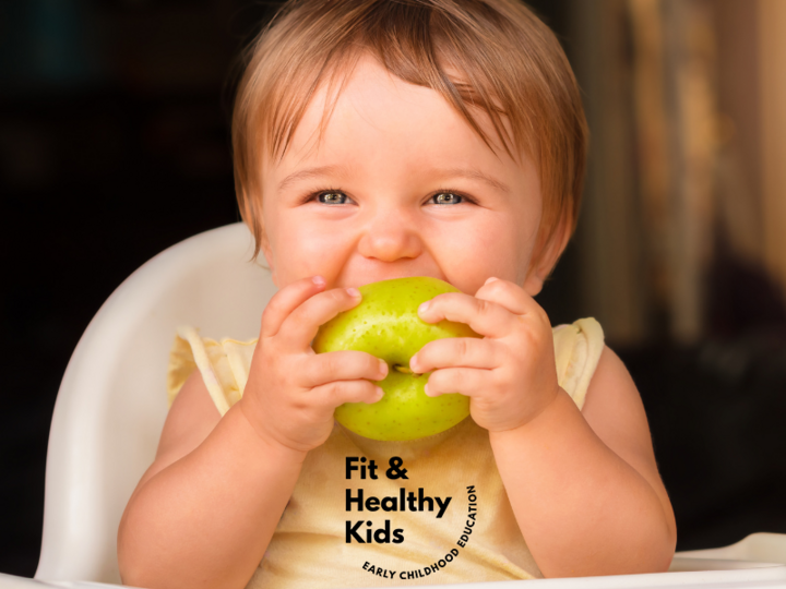Child eating an apple