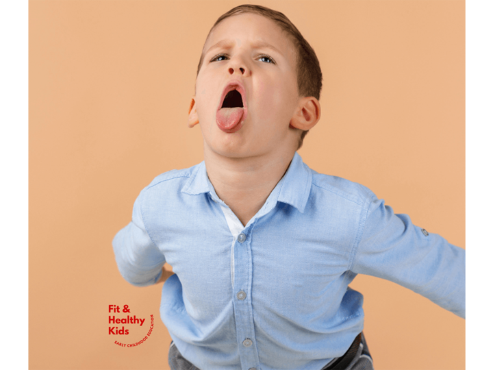 Young boy making a silly facial expression