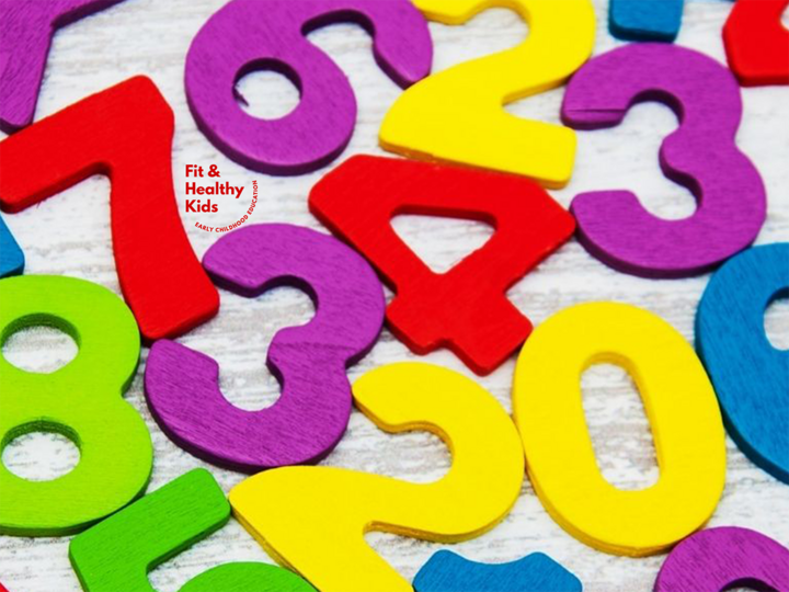 Numbers in assorted colors laying on table