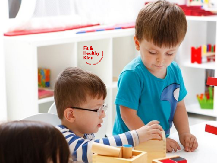 Children stacking blocks