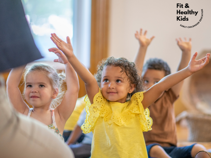Children with arms stretched upward