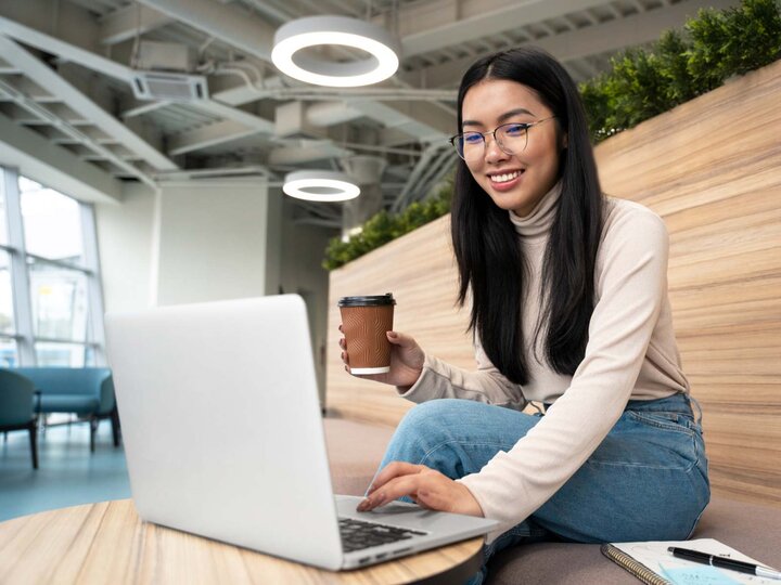 student with laptop studying sales development